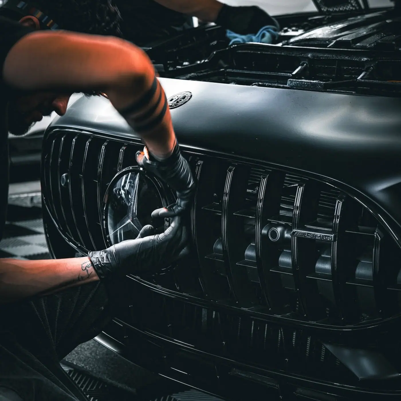 Mercedes-AMG grille taken out and cleaned by hand during a detail