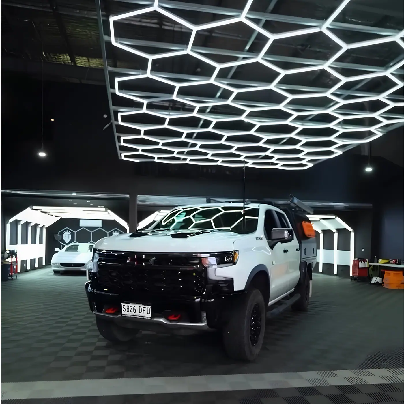 White ute detailed and protected under hexagon studio lighting